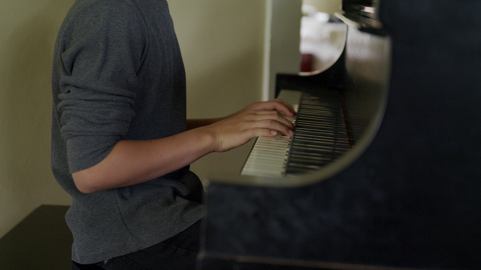 Adolescent Boy Playing The Piano At Home Stock Video Footage   FRN VideoClip AAH7358 Fallback.0000006 